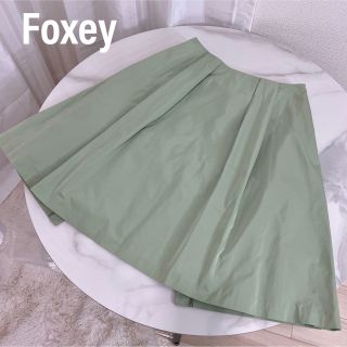 フォクシー(FOXEY)のFoxey フォクシー　フレアスカート　プリーツ　リボンデザイン　ひざ丈(ひざ丈スカート)