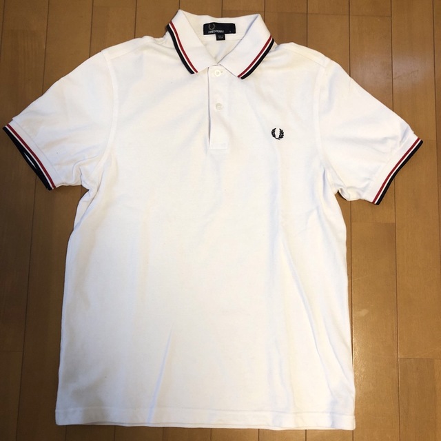 FRED PERRY(フレッドペリー)のシオリ　様専用フレッドペリー　半袖ポロシャツ　白　USED メンズのトップス(ポロシャツ)の商品写真