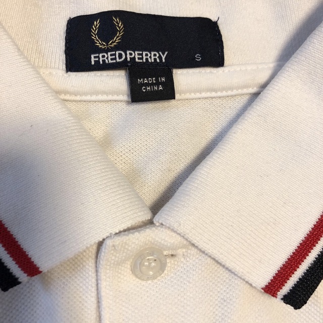 FRED PERRY(フレッドペリー)のシオリ　様専用フレッドペリー　半袖ポロシャツ　白　USED メンズのトップス(ポロシャツ)の商品写真