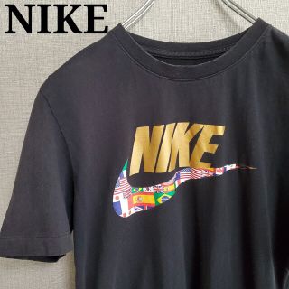 ナイキ(NIKE)のNIKE 国旗ロゴ ゴールド黒ブラック(Tシャツ/カットソー(半袖/袖なし))