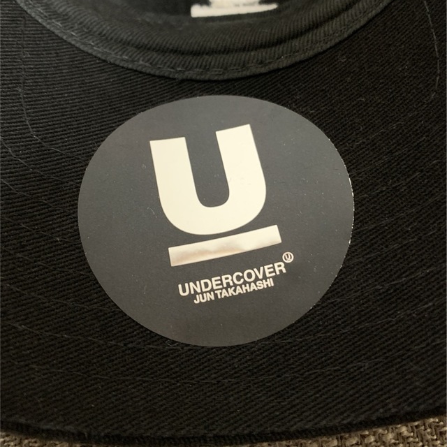 UNDERCOVER(アンダーカバー)のUNDERCOVER X NEW ERAコラボキャップ メンズの帽子(キャップ)の商品写真