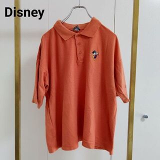ディズニー(Disney)のDisney(ディズニー）オレンジ/ポロシャツ(ポロシャツ)