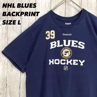 リーボック(Reebok)のアメリカ古着リーボックNHLブルース　チームロゴバックプリントTシャツLネイビー(Tシャツ/カットソー(半袖/袖なし))