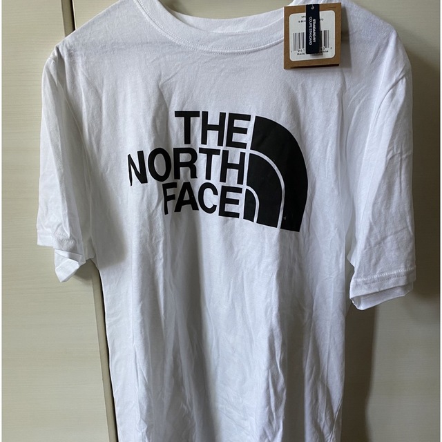 THE NORTH FACE(ザノースフェイス)の新品　ダグ付き　ノースフェイス　Ｔシャツ　M  アウトドア メンズのトップス(Tシャツ/カットソー(半袖/袖なし))の商品写真