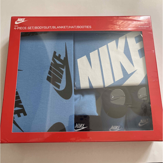 NIKE(ナイキ)のNIKE  ナイキ　4点セット　ロンパース　帽子　靴下　おくるみ　プレゼント キッズ/ベビー/マタニティのベビー服(~85cm)(ロンパース)の商品写真