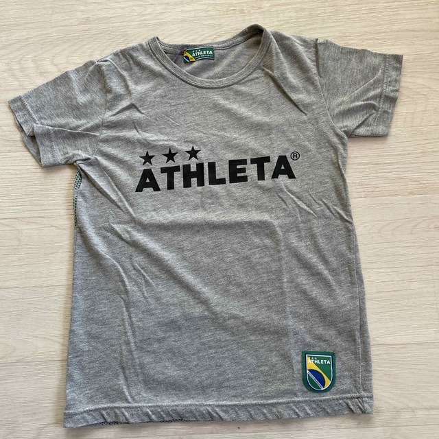 ATHLETA(アスレタ)のATHLETA  Tシャツ  150グレー スポーツ/アウトドアのサッカー/フットサル(ウェア)の商品写真
