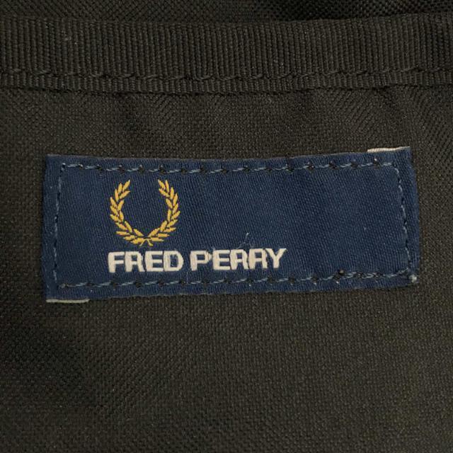 FRED PERRY(フレッドペリー)のFRED PERRY / フレッドペリー | 鹿の子 スエード レザー 切替 デイパック バックパック | ブラック | メンズ メンズのバッグ(バッグパック/リュック)の商品写真