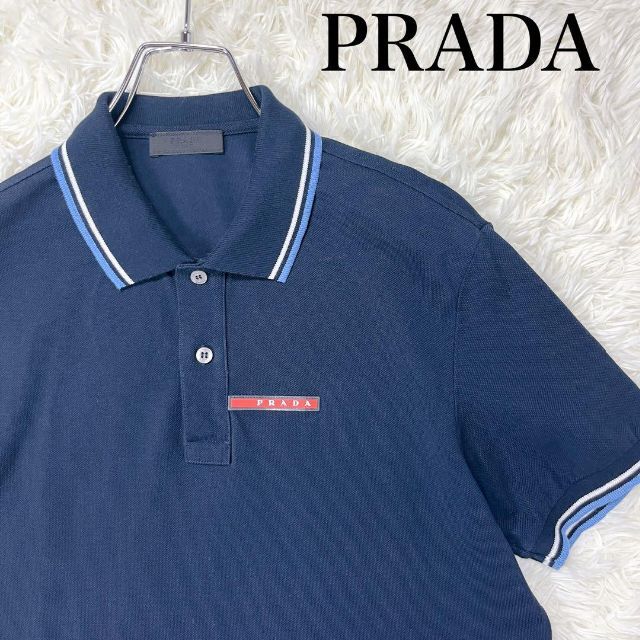 PRADA プラダ ポロシャツ Mサイズ ネイビー ロゴプレート - ポロシャツ