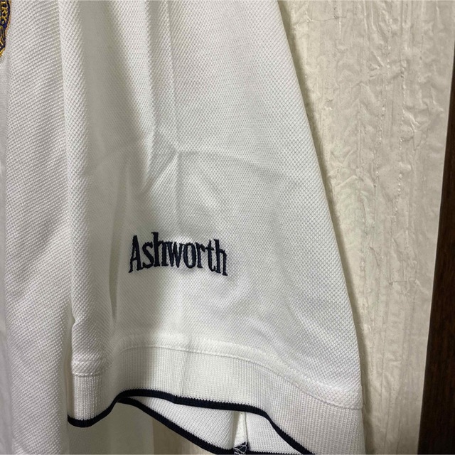 Ashworth(アシュワース)のAsworth　シンガポール・カントリークラブ　ホワイトポロシャツ（実家保管品） メンズのトップス(ポロシャツ)の商品写真