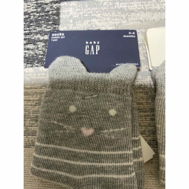 babyGAP(ベビーギャップ)の新品未使用gapベビー靴下3足グレーサイズ0〜6ヶ月用 キッズ/ベビー/マタニティのこども用ファッション小物(靴下/タイツ)の商品写真