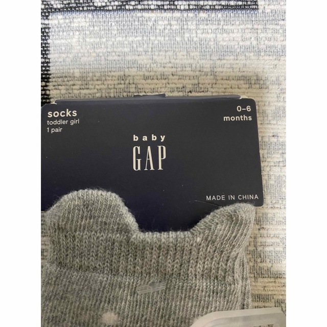 babyGAP(ベビーギャップ)の新品未使用gapベビー靴下3足グレーサイズ0〜6ヶ月用 キッズ/ベビー/マタニティのこども用ファッション小物(靴下/タイツ)の商品写真