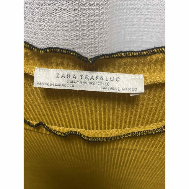 ZARA(ザラ)のzara trafaluc マスタード 長袖 薄手 セーター リブ フリル レディースのトップス(Tシャツ(長袖/七分))の商品写真