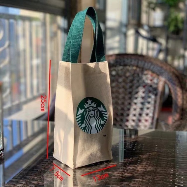 Starbucks(スターバックス)のスタバ海外限定 日本未販売ドリンク小物入れ　スナップ式　ベージュ　クリーム色  レディースのバッグ(トートバッグ)の商品写真