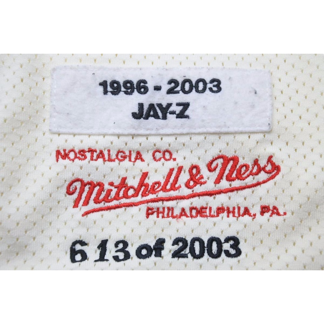 MITCHELL&NESS ミッチェルアンドネス タンクトップ 1996-2003 JAY-Z ROCAFELLA アイボリー オレンジ ブルー 54 美品 中古 49011 レディースのトップス(タンクトップ)の商品写真