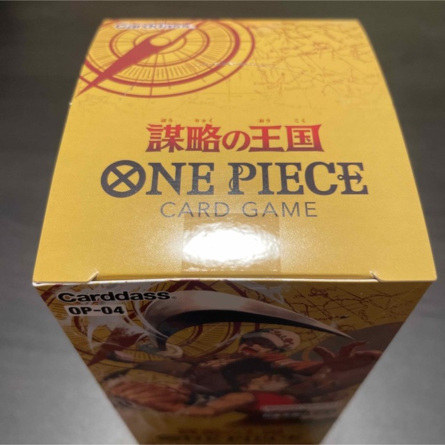 ONE PIECE(ワンピース)のワンピースカード  謀略の王国 新品 未開封 テープ付き エンタメ/ホビーのトレーディングカード(Box/デッキ/パック)の商品写真