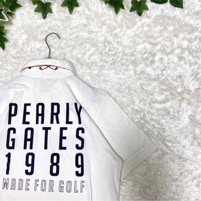 PEARLY GATES(パーリーゲイツ)のパーリーゲイツ　ポロシャツ  総柄　ワッペン　刺繍　4 古着　デカロゴ　お洒落 メンズのトップス(ポロシャツ)の商品写真