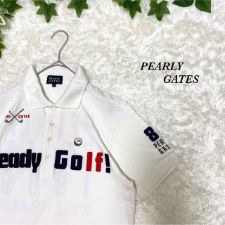 パーリーゲイツ(PEARLY GATES)のパーリーゲイツ　ポロシャツ  総柄　ワッペン　刺繍　4 古着　デカロゴ　お洒落(ポロシャツ)