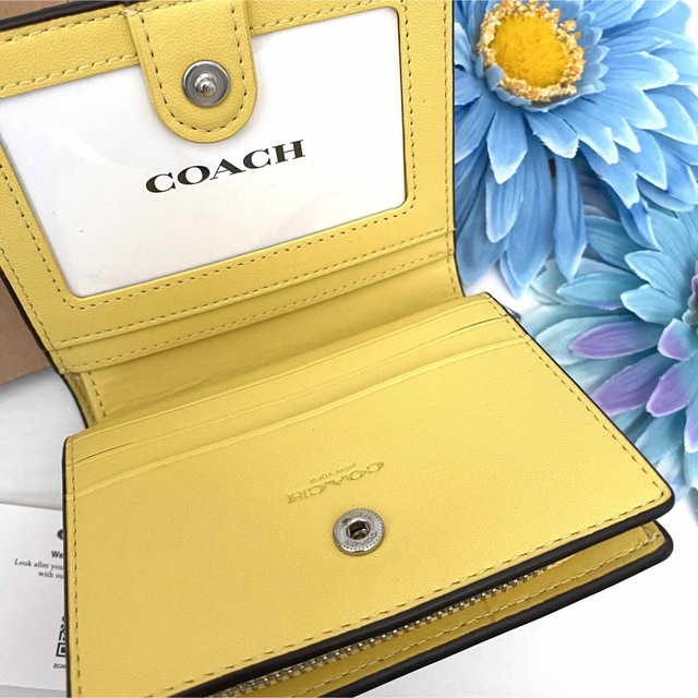 新品☆COACH(コーチ) ライトイエロー 花柄 シグネチャー レザー 折り財布