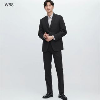 ユニクロ(UNIQLO)のUNIQLO 2022 ストレッチウールスリムフィットパンツ W88 ネイビー(スラックス)