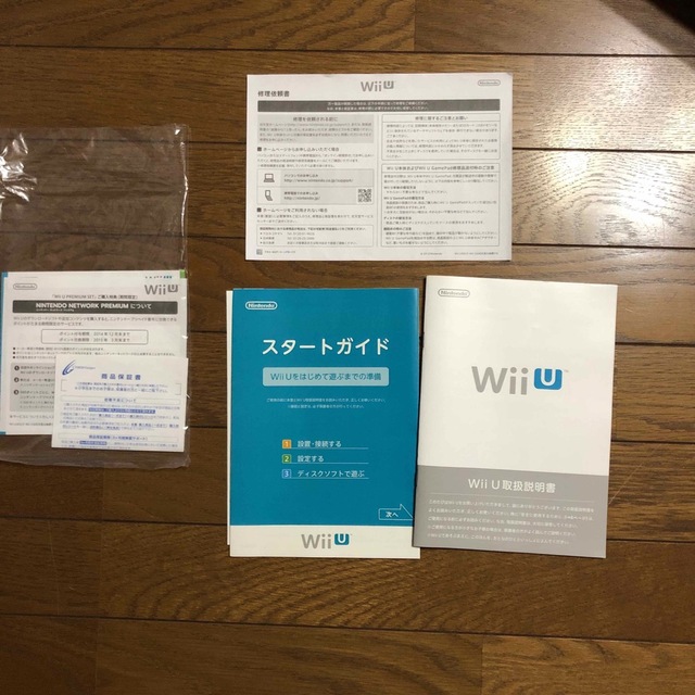 Wii U(ウィーユー)の【中古】ニンテンドーWiiU(ブラック)+ピクミン3、スプラトゥーン エンタメ/ホビーのゲームソフト/ゲーム機本体(家庭用ゲーム機本体)の商品写真