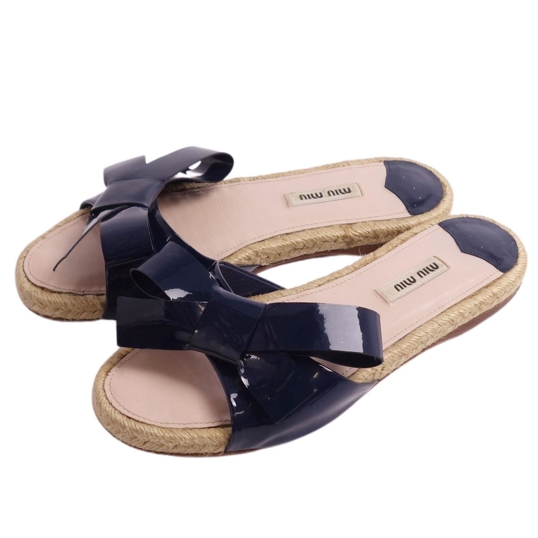 新品 MIU MIU フラット ストラップサンダル ミュール | finiscapital.com