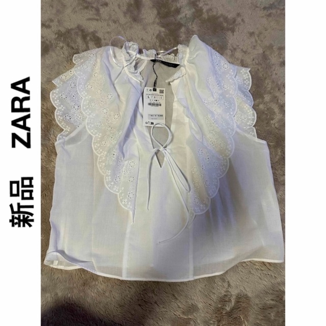 ZARA(ザラ)の【新品、未使用、札付き】ZARA 白レースブラウス　Lサイズ レディースのトップス(シャツ/ブラウス(半袖/袖なし))の商品写真