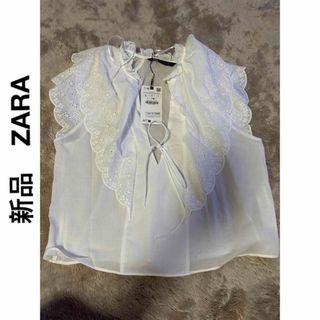 ザラ(ZARA)の【新品、未使用、札付き】ZARA 白レースブラウス　Lサイズ(シャツ/ブラウス(半袖/袖なし))