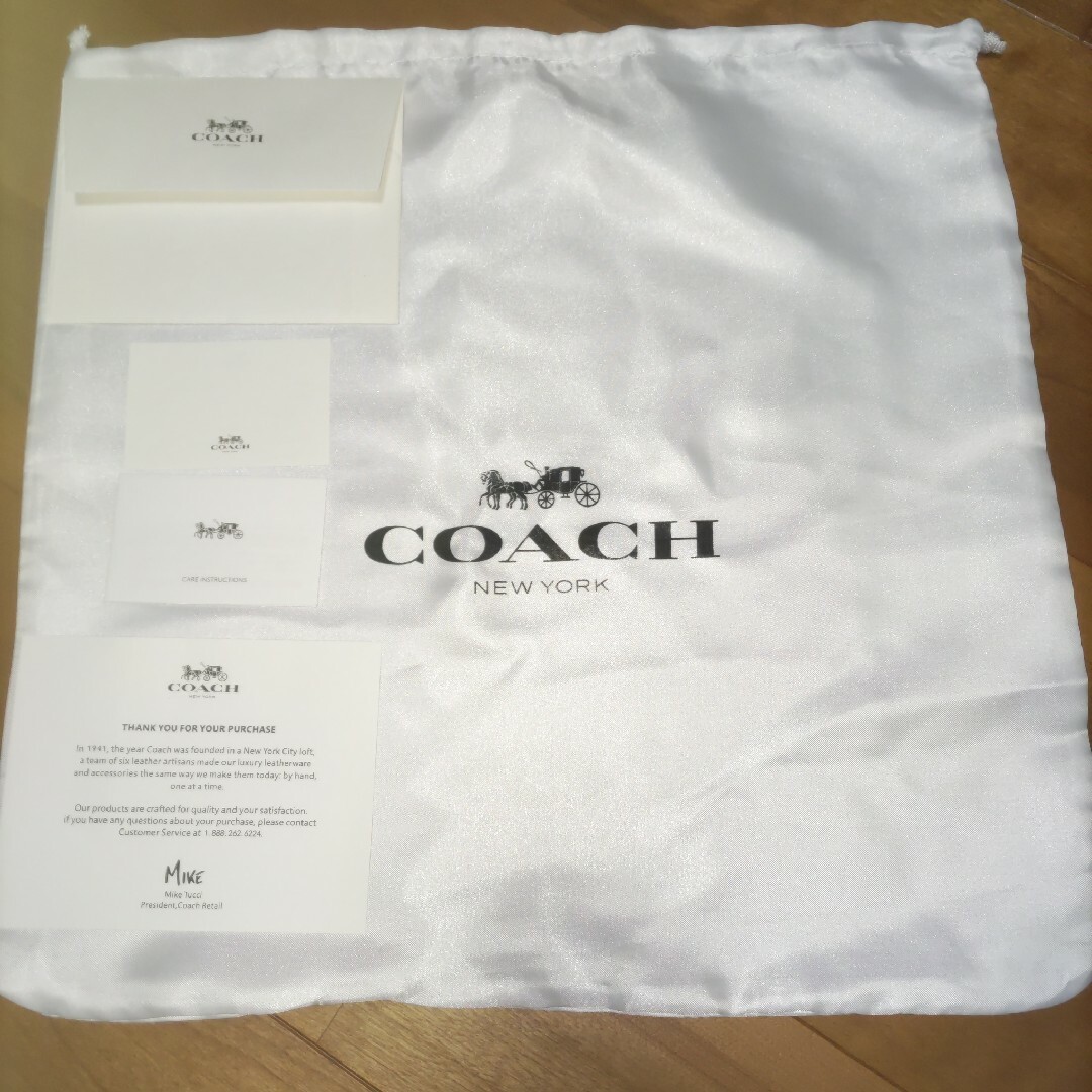 COACH(コーチ)のCOACH コーチ スヌーピー コラボ リュック ブラウン ワッペン レディースのバッグ(リュック/バックパック)の商品写真