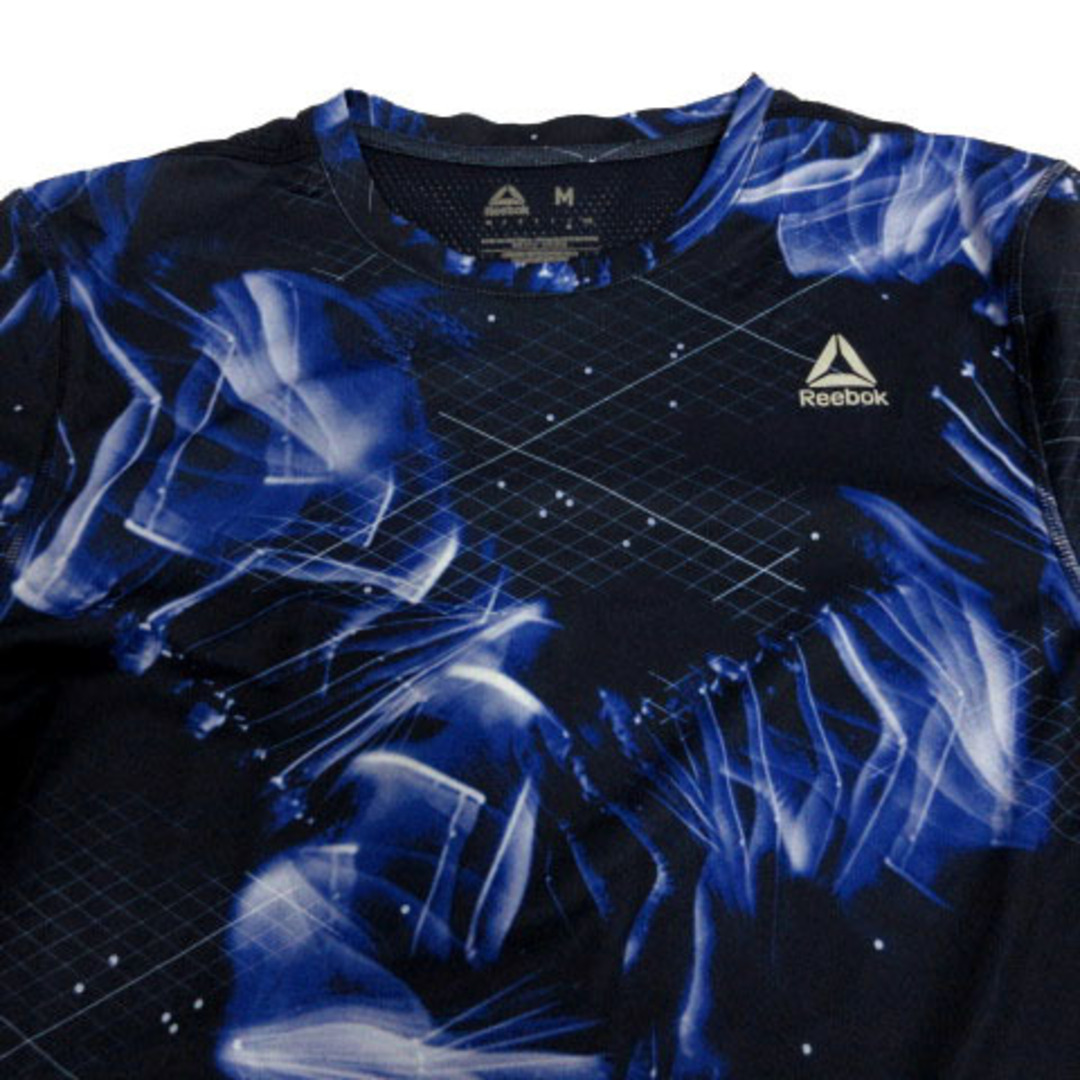 Reebok(リーボック)のReebok Tシャツ 半袖 メッシュ切替え ロゴ 速乾 総柄 紺 青 白 M スポーツ/アウトドアのスポーツ/アウトドア その他(その他)の商品写真