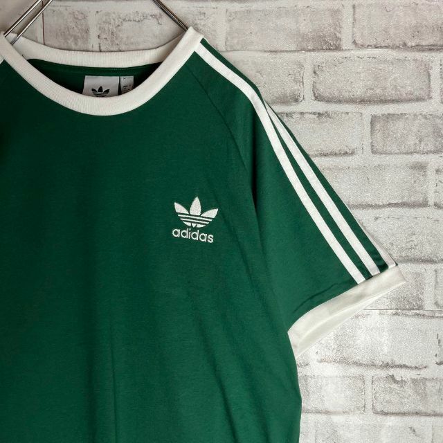 adidas(アディダス)の【あいみょん着用】アディダス⭐︎リンガーTシャツ　ワンポイント刺繍　濃緑 メンズのトップス(Tシャツ/カットソー(半袖/袖なし))の商品写真