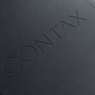 キョウセラ(京セラ)のCONTAX 純正 ブラック メタルキャップ K-84 ブラック (レンズ(単焦点))