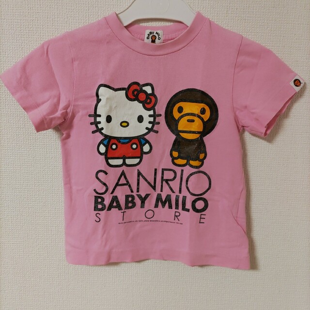 A BATHING APE(アベイシングエイプ)のベビーマイロ×ハローキティBAPE KIDSコラボTシャツ100cmピンク日本製 キッズ/ベビー/マタニティのキッズ服女の子用(90cm~)(Tシャツ/カットソー)の商品写真