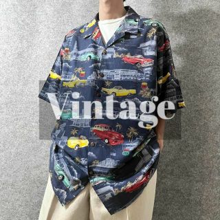 アートヴィンテージ(ART VINTAGE)の【vintage】ハワイ製 レトロカーデザイン 総柄 ルーズ アロハシャツ 4L(シャツ)