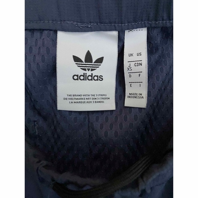 Originals（adidas）(オリジナルス)のadidas originalsアディダス　ナイロン　トラックパンツ　ネイビー メンズのパンツ(その他)の商品写真