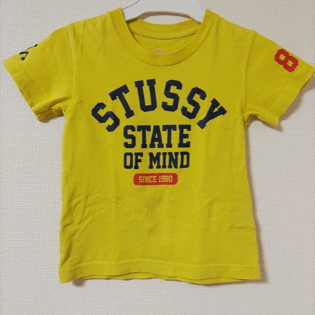 STUSSY(ステューシー)のSTUSSYキッズ半袖TシャツSサイズSTATE OF MIND黄色イエロー紺赤 キッズ/ベビー/マタニティのキッズ服男の子用(90cm~)(Tシャツ/カットソー)の商品写真