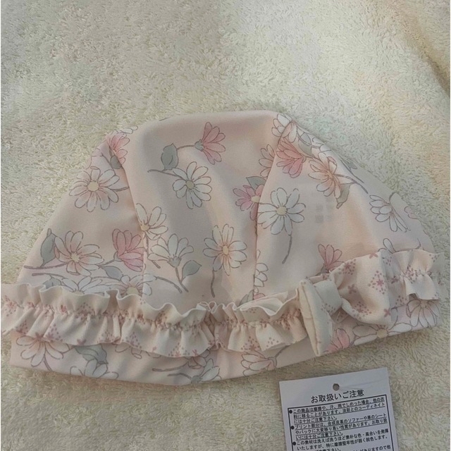 新品タグ付きお花柄🌸スイムキャップ キッズ/ベビー/マタニティのキッズ服女の子用(90cm~)(水着)の商品写真