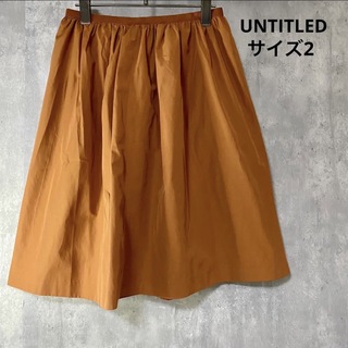 アンタイトル(UNTITLED)のアンタイトル　UNTITLED  橙　スカート　ポリエステル55%  サイズ2(ひざ丈スカート)