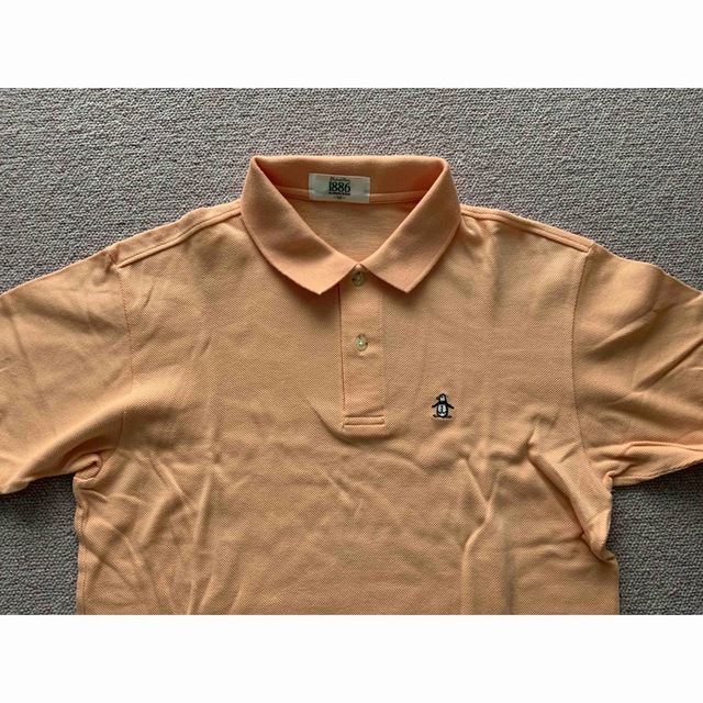 Munsingwear(マンシングウェア)のポロシャツ　オレンジ　マンシング レディースのトップス(ポロシャツ)の商品写真