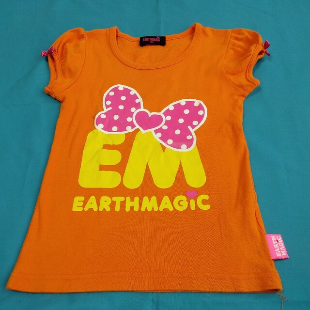 EARTHMAGIC(アースマジック)のEARTHMAGIC 可愛いオレンジカットソー キッズ/ベビー/マタニティのキッズ服女の子用(90cm~)(Tシャツ/カットソー)の商品写真