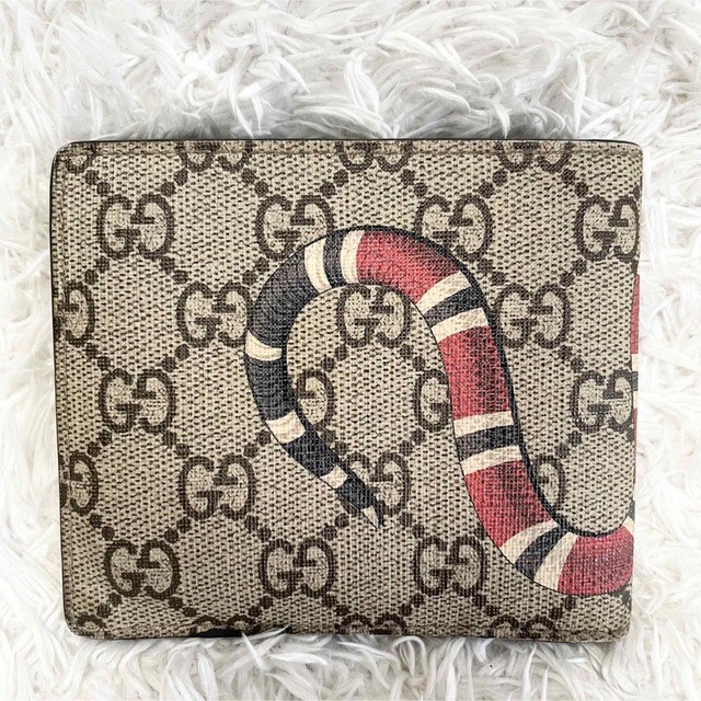 Gucci(グッチ)のグッチ 二つ折り財布 キングスネークプリント　蛇　GGキャンバス　ウォレット メンズのファッション小物(折り財布)の商品写真