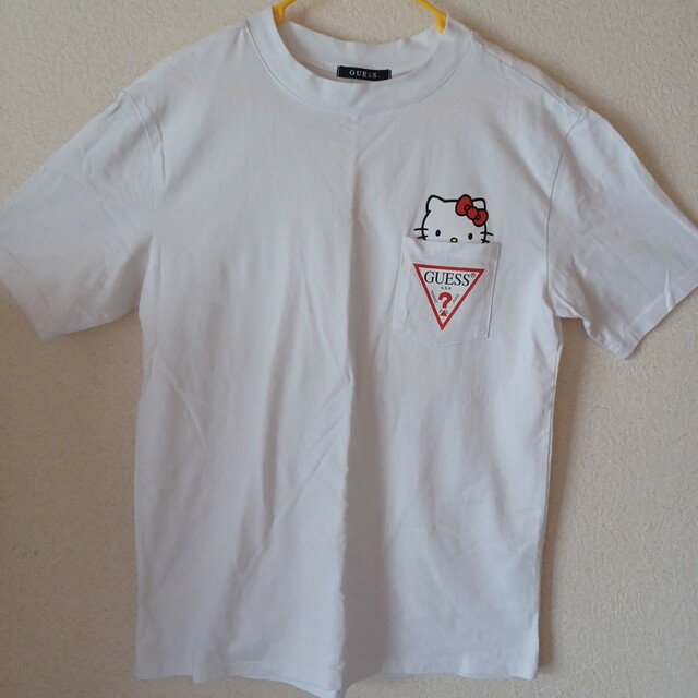 GUESS(ゲス)のキティ ゲス ポケット 半袖 Tシャツ メンズのトップス(Tシャツ/カットソー(半袖/袖なし))の商品写真