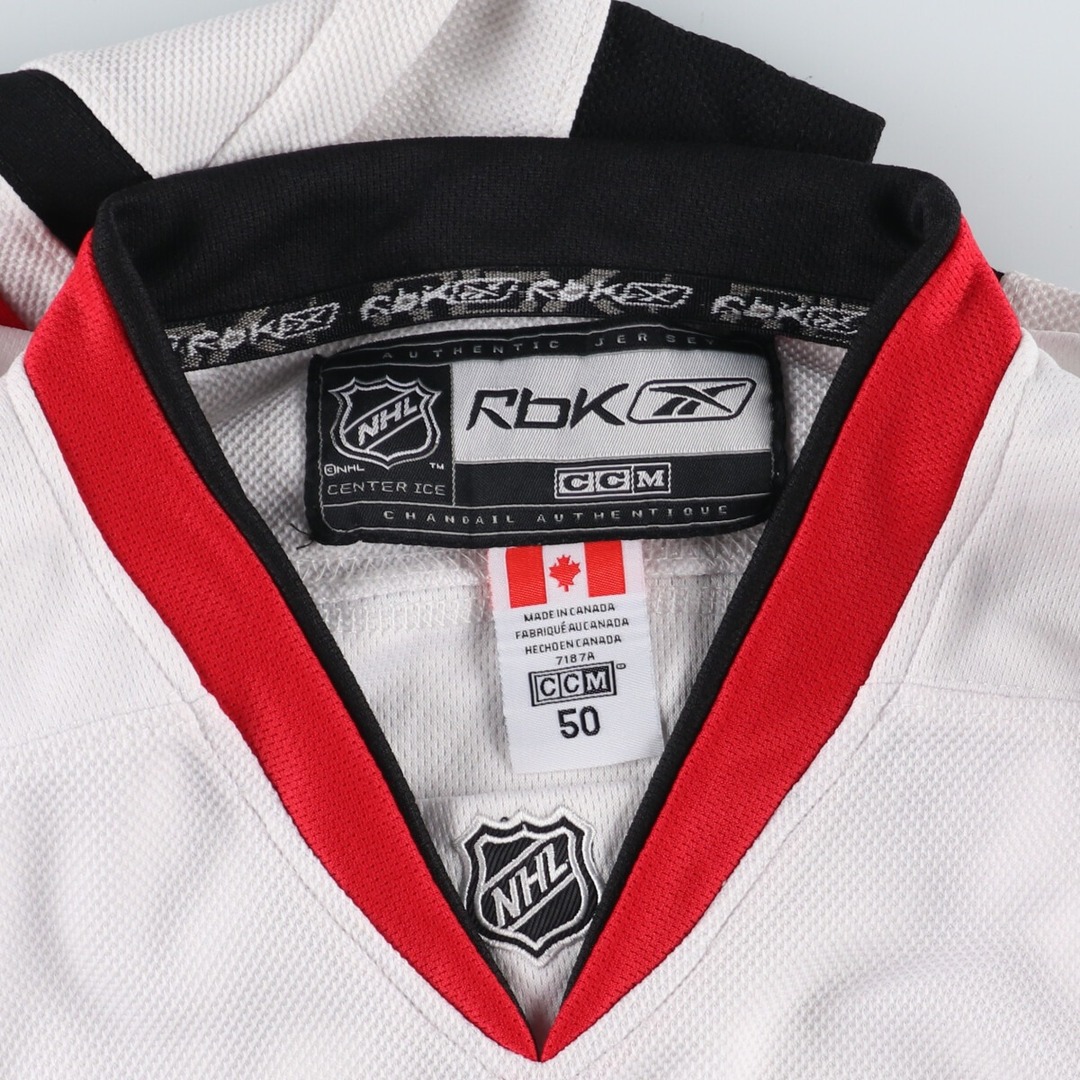 Reebok(リーボック)の古着 リーボック Reebok NHL CHICAGO BLACKHAWKS シカゴブラックホークス Vネック ゲームシャツ ホッケーシャツ カナダ製 メンズXL ヴィンテージ /eaa342058 メンズのトップス(Tシャツ/カットソー(半袖/袖なし))の商品写真