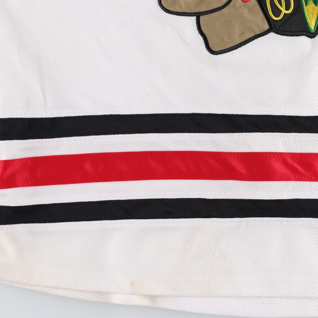 Reebok(リーボック)の古着 リーボック Reebok NHL CHICAGO BLACKHAWKS シカゴブラックホークス Vネック ゲームシャツ ホッケーシャツ カナダ製 メンズXL ヴィンテージ /eaa342058 メンズのトップス(Tシャツ/カットソー(半袖/袖なし))の商品写真