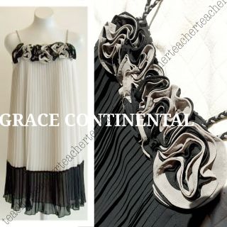 グレースコンチネンタル(GRACE CONTINENTAL)の薔薇 ふんわりフレアー プリーツ ワンピース ドレス 黒 バラ 素敵 可愛い(ひざ丈ワンピース)