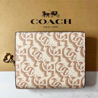 コーチ(COACH)のCOACH シグネチャー モノグラム プリント二つ折り財布 （チョーク）(財布)