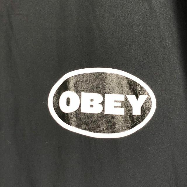 OBEY(オベイ)の『OBEY』オベイ (M) コットンフードジャケット / ロゴプリント ブラック メンズのジャケット/アウター(ナイロンジャケット)の商品写真