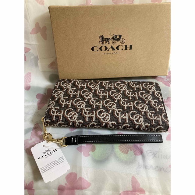 COACH(コーチ)のCOACH 茶色 ブラウン モノグラム 長財布 シグネチャー（専用紙袋　箱付き） レディースのファッション小物(財布)の商品写真