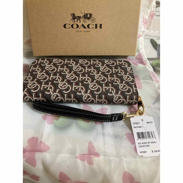 COACH(コーチ)のCOACH 茶色 ブラウン モノグラム 長財布 シグネチャー（専用紙袋　箱付き） レディースのファッション小物(財布)の商品写真