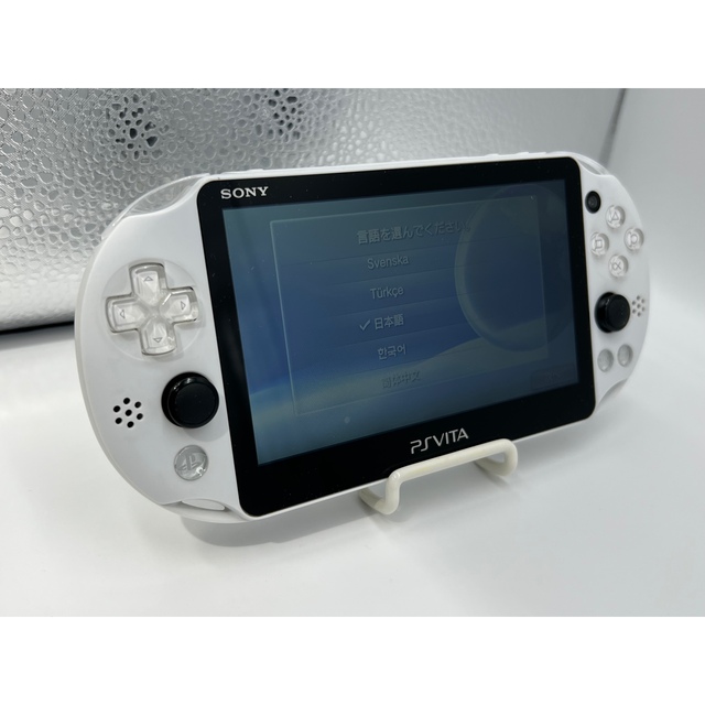 PlayStation Vita(プレイステーションヴィータ)の【完品・液晶美品】PS Vita PCH-2000 ホワイト 本体 ソニー エンタメ/ホビーのゲームソフト/ゲーム機本体(携帯用ゲーム機本体)の商品写真