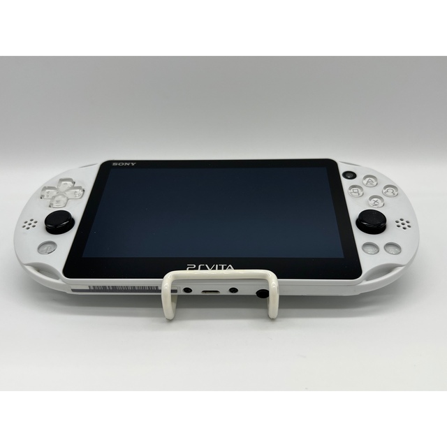 PlayStation Vita(プレイステーションヴィータ)の【完品・液晶美品】PS Vita PCH-2000 ホワイト 本体 ソニー エンタメ/ホビーのゲームソフト/ゲーム機本体(携帯用ゲーム機本体)の商品写真